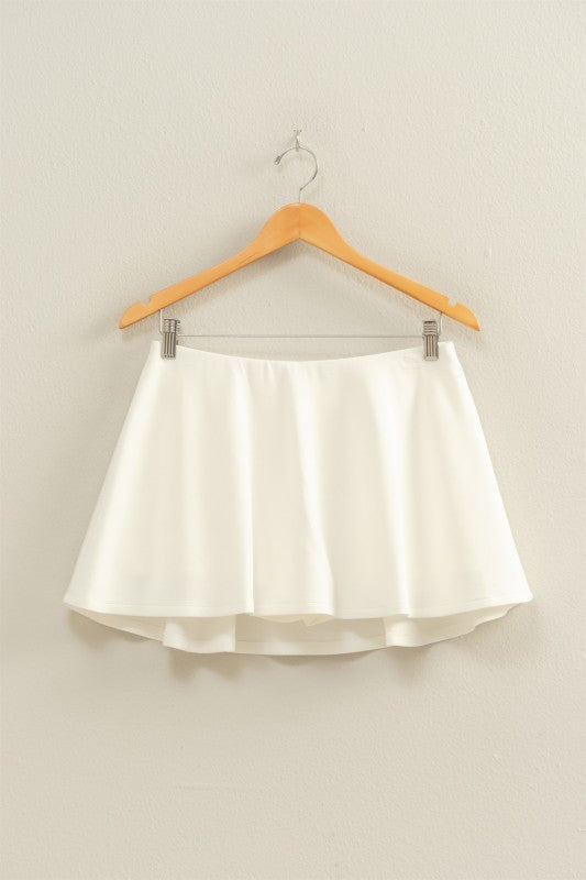 Flirty double knit mid waist skort