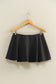 Flirty double knit mid waist skort